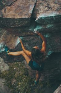 A woman bouldering